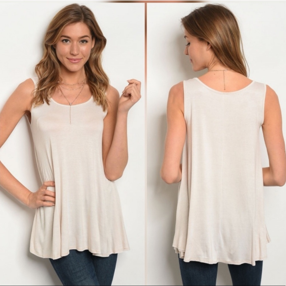 Beautiful cream relaxed fit tank. Various sizes